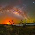 June (2018) on the flanks of Mauna Kea, looking toward the Kilauea eruption- Koa trees, fissure 8, and the Milky Way.jpg